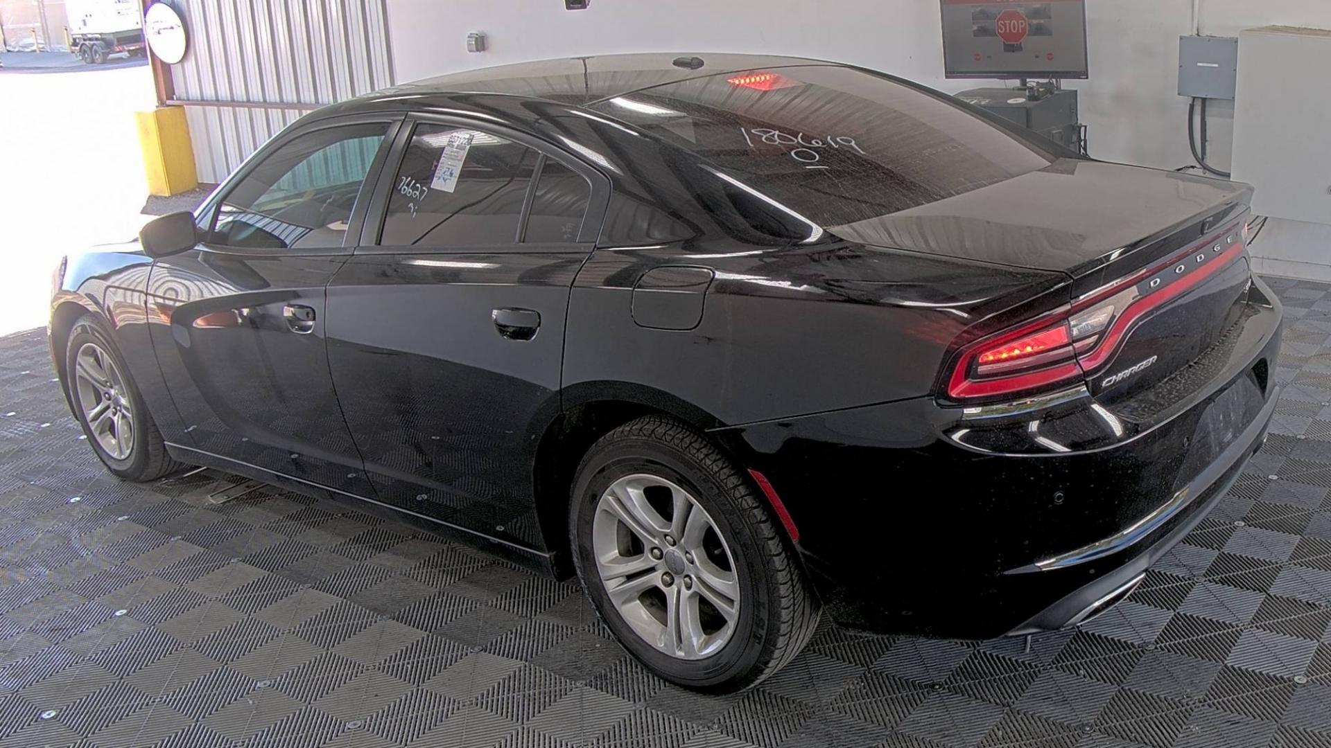 2018 Black Dodge Charger (2C3CDXBG2JH) , located at 2020 East Division Street, Arlington, TX, 76011, (817) 801-3191, 32.742390, -97.076874 - This midnight black Dodge Charger is available for you to come drive away with today! Premiere Buy Here Pay Here with NO Credit Check (score) at 2020 East Division Street, Arlington, Texas, located in the center of the Dallas/Fort Worth metro area. For in-house financing in Lancaster, Waxahachie - Photo#2